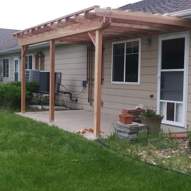 Pergola over concrete patio