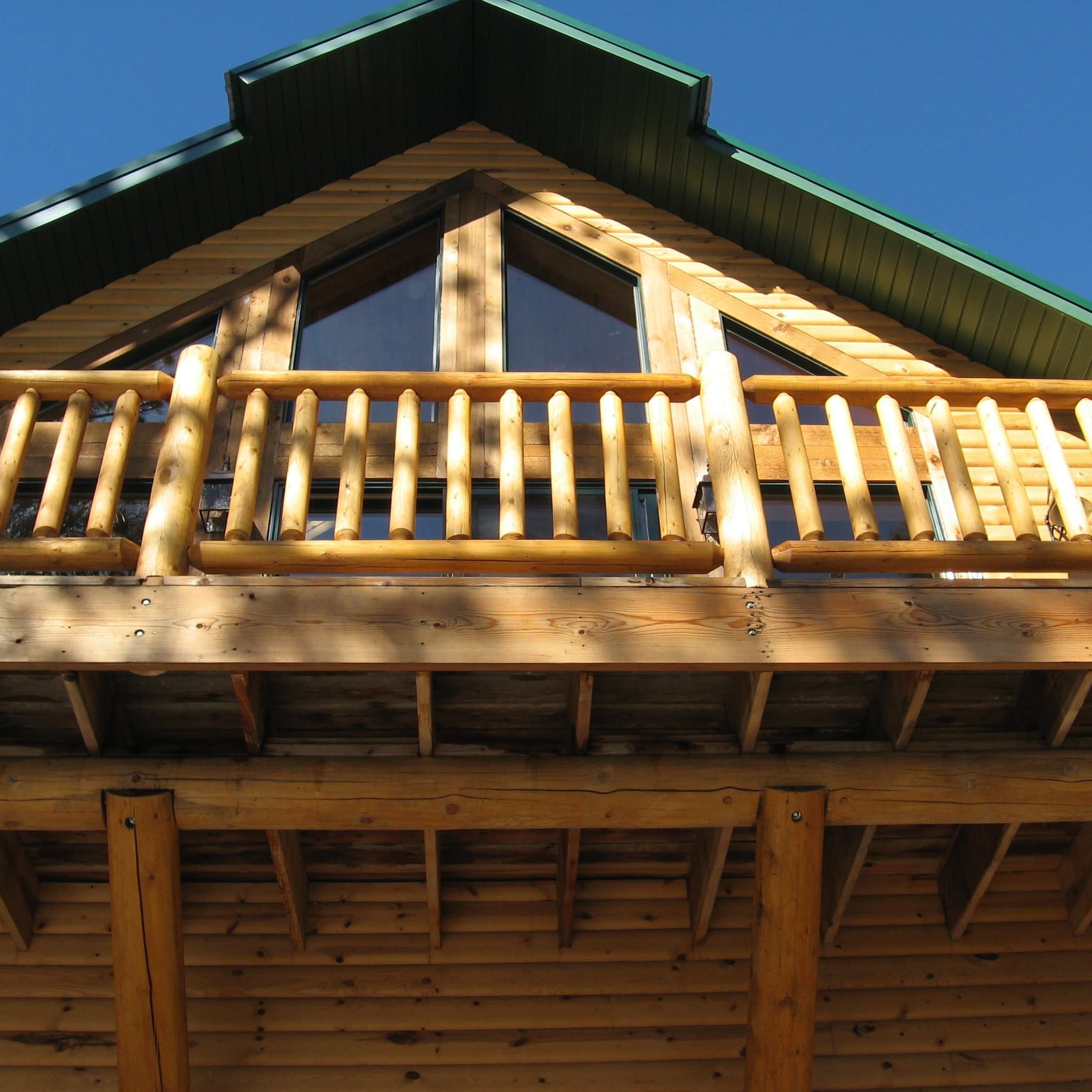 Wood deck with log railing